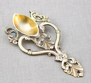 Vintage <b>Gold</b> Plated Metal Tea <b>Spoon</b> With Long Handle And Ornate Design For Decorative Use And Kitchenware Use - Product Image 1