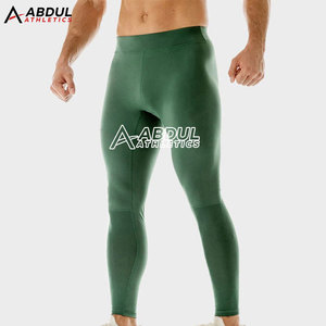 Leggings de compresión elásticos con ajuste de soporte y tela que absorbe la humedad, ideales para entrenamiento de yoga y uso diario. - Product Image 2