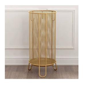 Elegante y bien hecho soporte para zapatos de metal dorado pulido que evita la formación de pilas de zapatos en toda la casa. - Product Image 3