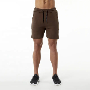 กางเกงขาสั้นออกกำลังกายสีน้ำตาลสำหรับผู้ชาย ขายดี ทนทาน ผลิตจากผ้าโพลีเอสเตอร์ผสมคอตตอน เอวกลาง มีเชือกผูก ปรับแต่งโลโก้ได้ มีกระเป๋าข้าง ไซส์ US - Product Image 1