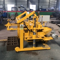 Chine petite matrice ciment hydraulique pavé creux brique pose bloc machine automatique 8 pouces bloc de ciment presse faisant la machine