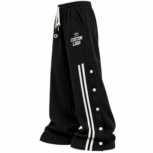 Pantalon de survêtement Hip Hop surdimensionné en molleton noir épais, coupe large, avec double bandes blanches et panneaux latéraux à boutons-pression - Product Image 1