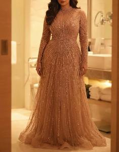 ชุดราตรีผ้าซีควินสีโรสโกลด์สั่งตัดพิเศษ ประดับลูกปัดลายดาวหรูหรา คอสูง แขนยาว ยาวถึงพื้น สำหรับงานพิธีการ - Product Image 1