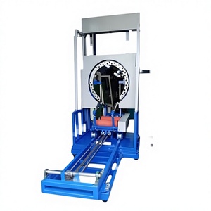 Machine d'enroulement automatique de bobines verticales triphasée avec emballage plastique et système de levage et de descente par engrenages - Product Image 1