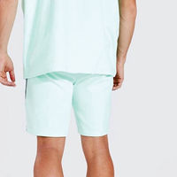 Conjuntos de camiseta y pantalones cortos de dos piezas para hombre, informales, de verano, transpirables, de algodón, con cuello redondo, de color sólido, para hombre y mujer.