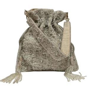 Sac à main seau texturé ivoire perlé avec large bandoulière et pompon, élégant pour mariage et occasions spéciales - Product Image 1