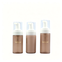 Bouteille à pompe en mousse givrée personnalisée de 100 ml à 200 ml avec matériau PET pour usage industriel dans les crèmes pour le visage et les nettoyants pour le visage