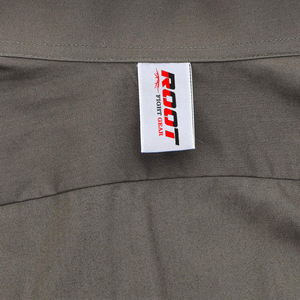 Chemise de travail autrichienne à manches longues en coton vert olive avec poches poitrine et bretelles - Product Image 5