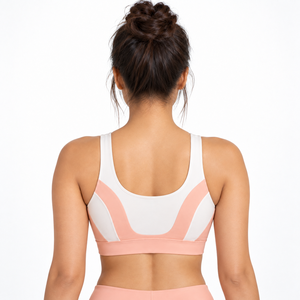 Soutien-gorge de sport en tissu extensible doux, offrant une couverture confortable et un maintien fiable pour la course à pied, les entraînements et les activités sportives. - Product Image 3