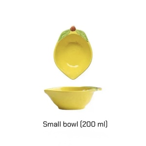 Service de vaisselle créatif en céramique jaune en forme de citron, comprenant un saladier, un bol à dessert et une assiette à fruits. - Product Image 6