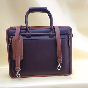 Bolso para portátil de cuero OEM, el más vendido, para uso empresarial, teñido liso, estilo casual de fábrica, con múltiples bolsillos. - Product Image 1