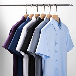 Camisa de manga corta para hombre, mezcla de poliéster y fibra de bambú, con botones, estilo casual de negocios, color sólido, para oficina, trabajo, verano. - Product Image 1