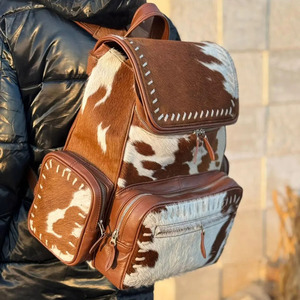 Premium handmade cowhide leather hair on school <b>backpacks</b> wholesale custom OEM supplier high quality student laptop bags - Product Image 2