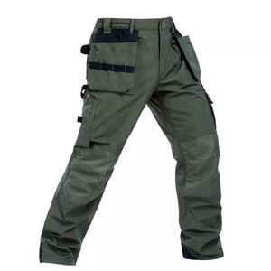 Heavy duty workwear pants for men with reinforced <b>knees</b> and utility pockets for construction and industrial use - Product Image 4