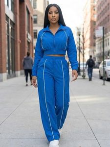 Ensemble 2 pièces sportif bleu pour femme : veste courte et pantalon large taille haute coupe décontractée – Collection Printemps/Été – Style streetwear décontracté - Product Image 1