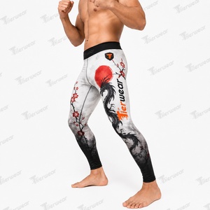 กางเกงเลกกิ้งออกกำลังกายผู้ชาย MMA ผ้าโพลีเอสเตอร์ผสมสแปนเด็กซ์ 220 GSM ยืดหยุ่น ระบายอากาศ แห้งเร็ว สำหรับฝึกซ้อม OEM สำหรับผู้ใหญ่ - Product Image 4