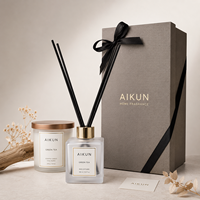 Coffret cadeau diffuseur de parfum et bougie parfumée AIKUN en verre givré de luxe avec bouchon doré pour la vente en gros aux hôtels