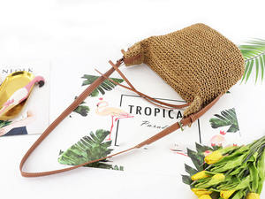 Discover the ultimate urban <b>accessory</b> with this stylish Natural yarn bag featuring a structured brown body and long shoulder - Product Image 3