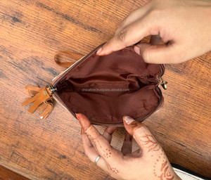 Venta caliente hecho a mano de cuero de vaca borla bolsa occidental de cuero genuino Boho cartera pelo en ocultar cremallera embrague para mujer - Product Image 4