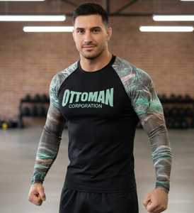 ออกแบบโลโก้ของคุณเองได้ตามต้องการ  ชุดรัดรูปแขนยาวพิมพ์ลายด้วยความร้อน  สินค้ามาใหม่ ชุด MMA สำหรับผู้ใหญ่ ผ้าสแปนเด็กซ์/ไนลอน แห้งเร็ว คุณภาพสูง - Product Image 1