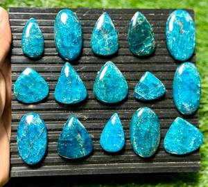 อะพาไทต์ทรงคาโบชองแบบเรียบขายส่ง : อะพาไทต์สีน้ำเงินนีออนธรรมชาติแบบหลังแบนสำหรับทำเครื่องประดับ MAHNAJ GEMS - Product Image 4