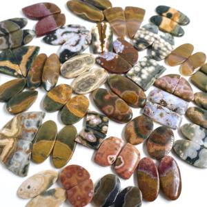 Le fournisseur de Jaipur propose des cabochons en vrac de haute qualité en jaspe océanique naturel de coupe ovale pour la fabrication de bijoux fournitures en gros - Product Image 1