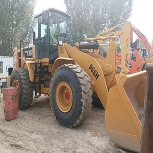 Chargeuse Caterpillar 966H d'occasion, moteur CAT, faible nombre d'heures, avec brise-roche et équipement de manutention industrielle - Product Image 2