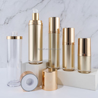 Ensemble de cosmétiques en acrylique bouteilles et bocaux série bouteilles d'emballage sans air rondes droites dorées pour lotion crème Essence huile sérum