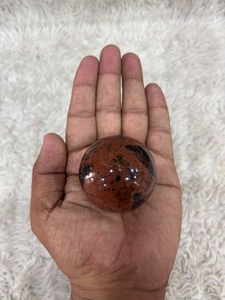 Sphère d'obsidienne acajou avec de riches motifs brun chocolat et noirs, texture de verre volcanique brillante, forme arrondie - Product Image 1