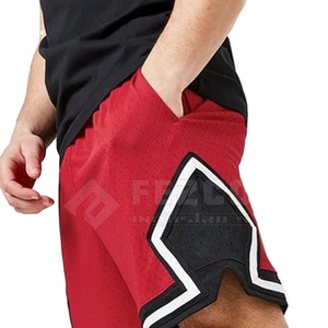 กางเกงขาสั้นออกกำลังกายผู้ชายออกแบบพิเศษ ผ้าโพลีเอสเตอร์ผสมคอตตอน 100% ระบายอากาศ แห้งเร็ว เอวยางยืดกลางลำตัว มีกระเป๋าข้างลึกสองช่อง - Product Image 1