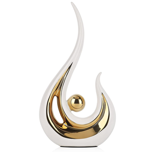 Sculpture abstraite de flamme blanche avec un intérieur doré et une sphère flottante. Lux moderne disponible à prix de gros. - Product Image 1