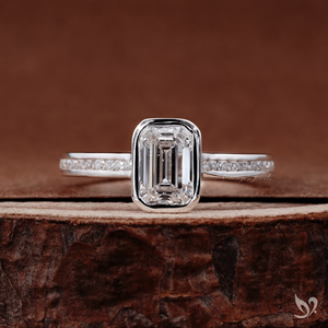Sleek emerald cut 1ct lab grown diamond ring with bezel <b>frame</b> and channel band in 10k white gold - Product Image 1