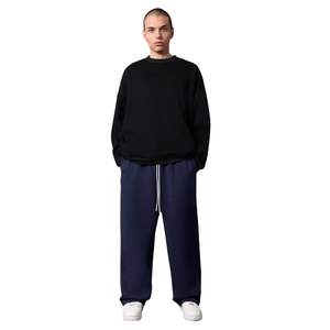 Pantalones de chándal personalizados de algodón de punto con forro polar, cintura elástica, de peso medio, holgados, de pierna ancha, estilo baggy, para hombre, de ajuste relajado, para invierno - Product Image 1