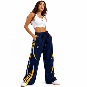 Pantalon de jogging à taille élastique personnalisée avec cordon de serrage, coupe large, pour femme, avec passepoil contrastant, également disponible pour homme - Product Image 1