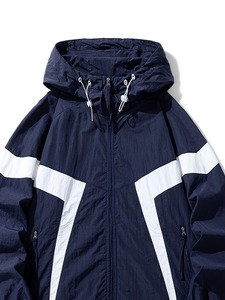 Chaqueta Cortavientos Impermeable de Alta Calidad para Mujer, Diseño Personalizado al por Mayor, Blanca con Doble Parche y Bloques Multicolores, Unisex, de Secado Rápido - Product Image 3