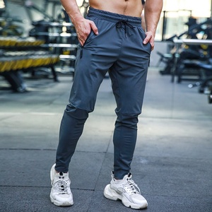 Vente en gros, pantalon de jogging personnalisé pour homme, pantalon de survêtement en tissu et toile de couleur unie, pantalon de jogging de style décontracté - Product Image 3