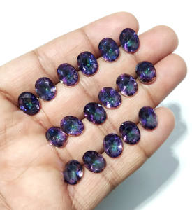 Topacio Místico Ovalado Facetado Creado en Laboratorio al por Mayor |   Piedra Suelta con Recubrimiento Arcoíris |   8x10 mm |   Uso en la Creación de Joyas - Product Image 4