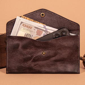 Enveloppe à monnaie en cuir véritable conçue pour le rangement de l'argent, la planification budgétaire, l'organisation des voyages, les dépenses quotidiennes et les reçus, à vendre. - Product Image 1