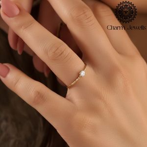 แหวนหมั้นผู้หญิง Charm_Jewells ชุบทอง 18K ประดับเพชรโมอิสซาไนต์ทรงลูกแพร์ ดีไซน์เรียบหรู - Product Image 6