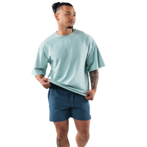 T-shirts Homme Oversize de Haute Qualité Personnalisables en Coton Uni 100% avec Logos Imprimés Respirants à Manches Courtes Coupe Décontractée Longue - Product Image 1