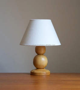 Masterfully handcrafted wooden <b>lamps</b> with sculpted carved textures hand-polishing paired with designer-grade lampshades. - Product Image 1