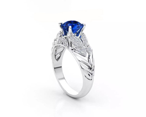 Bague en argent 925 avec pierre bleue, sertie de CZ blancs, motif feuille, bijoux de luxe pour femmes - Product Image 1