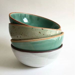 <b>Ceramic</b> <b>serving</b> <b>bowl</b> with drip glaze detail and rustic flair made for farmhouse tables or neutral toned kitchens - Product Image 1