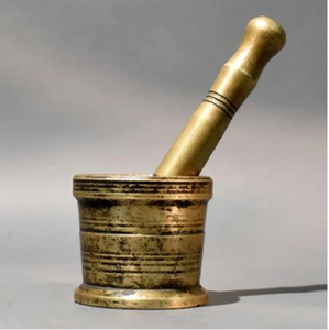 Elegant brass mortar pestle set with traditional carved scrollwork body pattern, available at wholesale prices. - Product Image 2