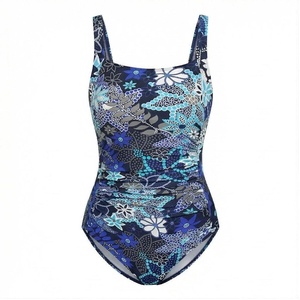 Ensemble de yoga 2 pièces imprimé papillon bleu avec finition dorée, body à col en V profond et jupe portefeuille longueur genou - Product Image 1