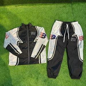 Conjuntos de Chaqueta Cortavientos de Nailon de Alta Calidad 2026, Venta al Por Mayor, Logotipo Personalizado, Conjunto Deportivo Informal de 2 Piezas para Hombre - Product Image 6