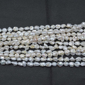 ลูกปัดไข่มุกน้ำจืดสีขาวธรรมชาติขนาด10มม. 12มม. 14มม. 16มม. ลูกปัดหินก้อนคุณภาพระดับ AAA สำหรับเครื่องประดับแฟชั่น - Product Image 3