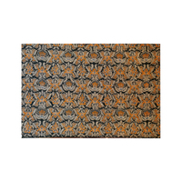 Tissu brocart imprimé avec motif floral orange et argenté sur fond foncé, jacquard tissé, textile d'ameublement