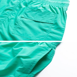 Shorts de bain vert uni pour homme Crown Gate International, taille mi-haute avec cordon de serrage, respirant, séchage rapide, décontracté, coupe classique, idéal pour l'été - Product Image 2