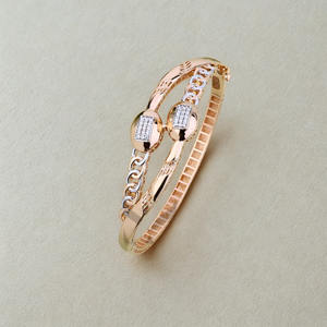 Rose gold plated ladies <b>bangle</b> with dual oval <b>charm</b> chic designer womens jewellery stylish lightweight bracelet - Product Image 2